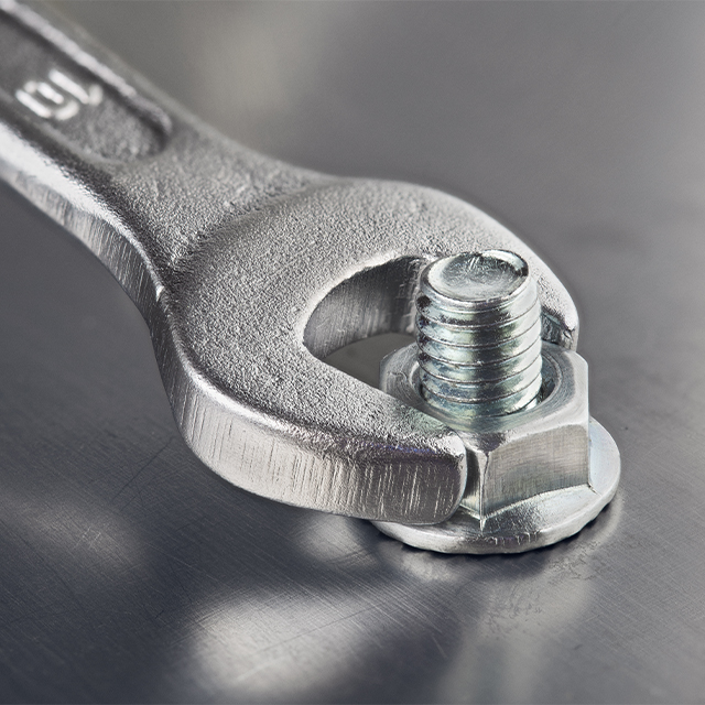Picture of a spanner tightening a bolt