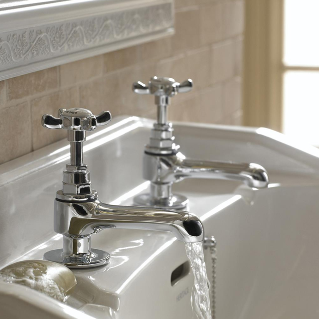 Picture of a pair of traditional basin taps