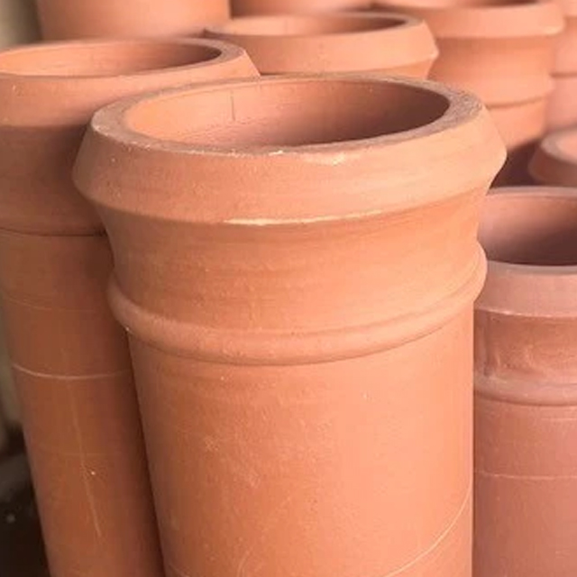 Picture of a collection of terracotta chimney pots