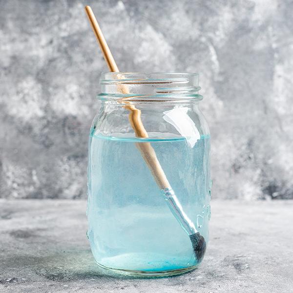 Picture of paint brush in jar of water