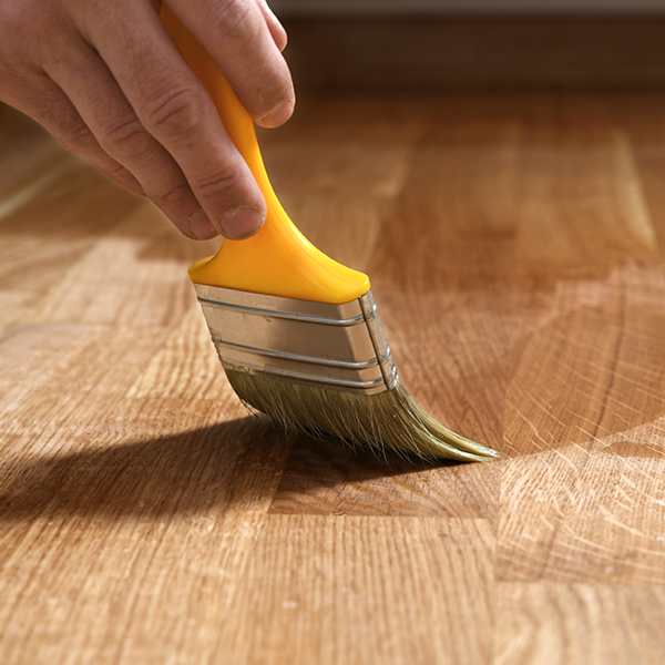 Floor varnish being applied