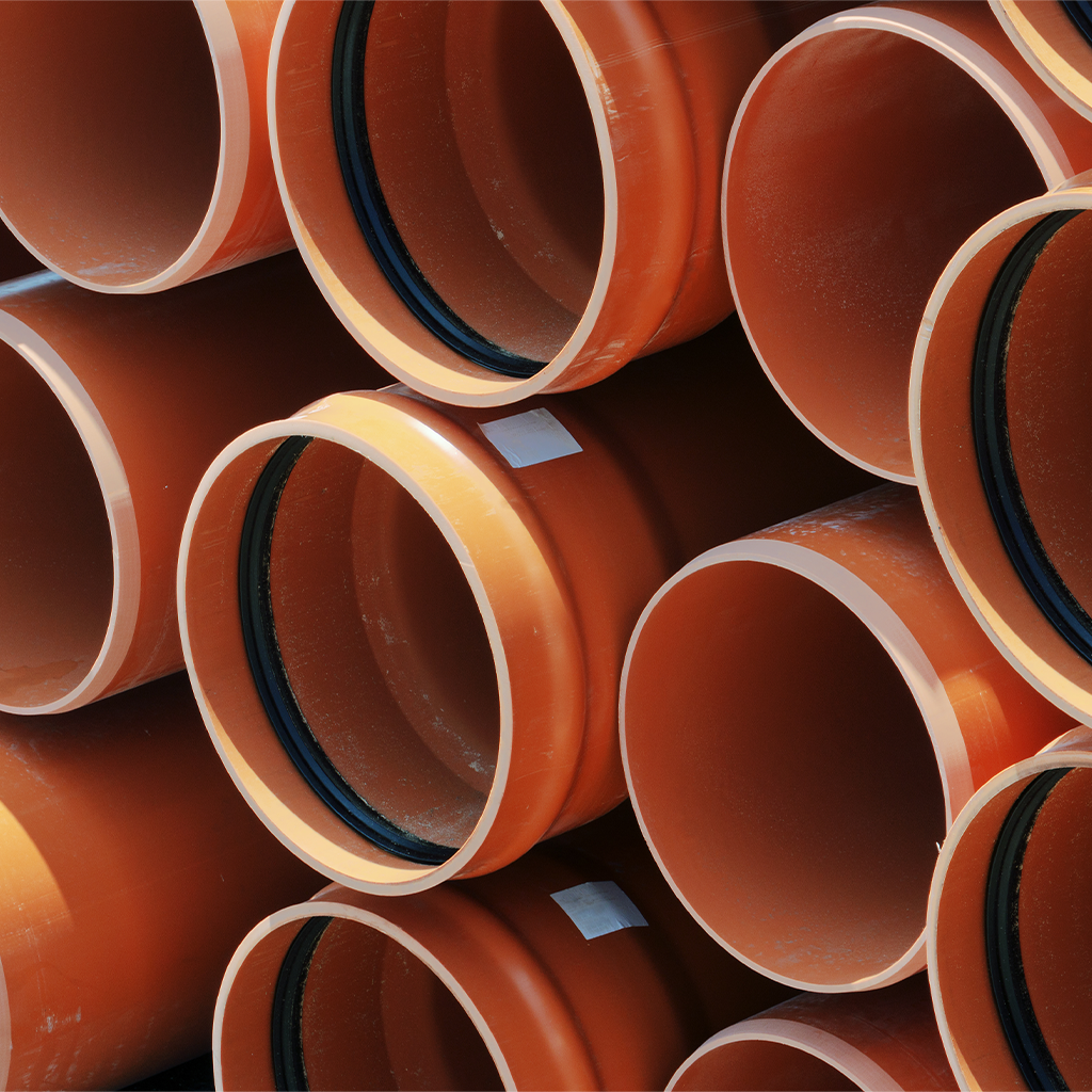 Lengths of underground orange pipe