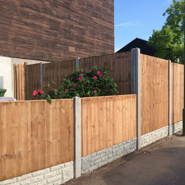 A picture of fencing with gravel boards
